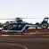a helicopter sitting on top of an airport tarmac